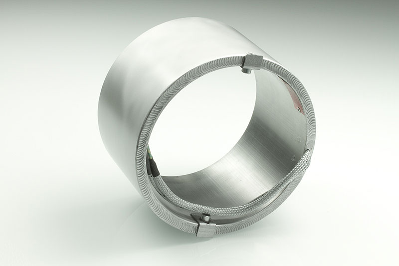 Band Heater , temperatures up to 450°C, injection molding, extrusion, energy-efficient design, homogeneous heat flow, holes, cutouts, integrated thermocouple, shape fulfilling contact