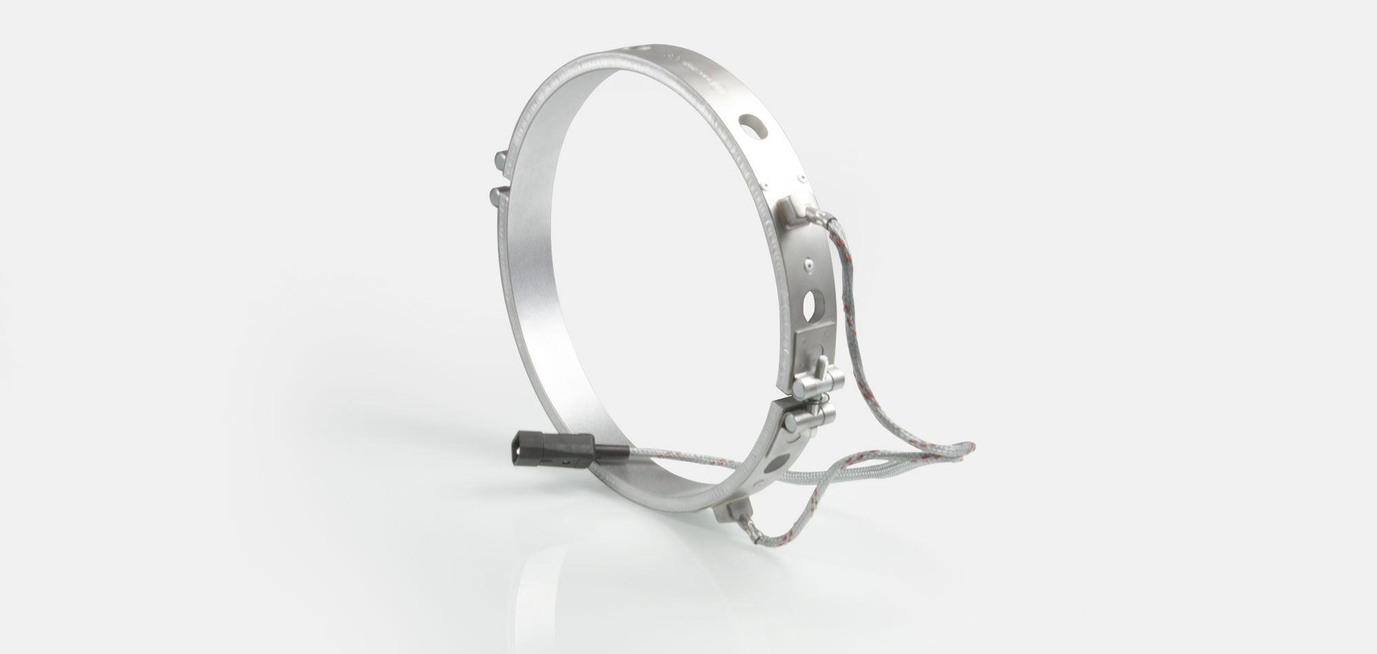 Band Heater , temperatures up to 450°C, injection molding, extrusion, energy-efficient design, homogeneous heat flow, holes, cutouts, integrated thermocouple, shape fulfilling contact