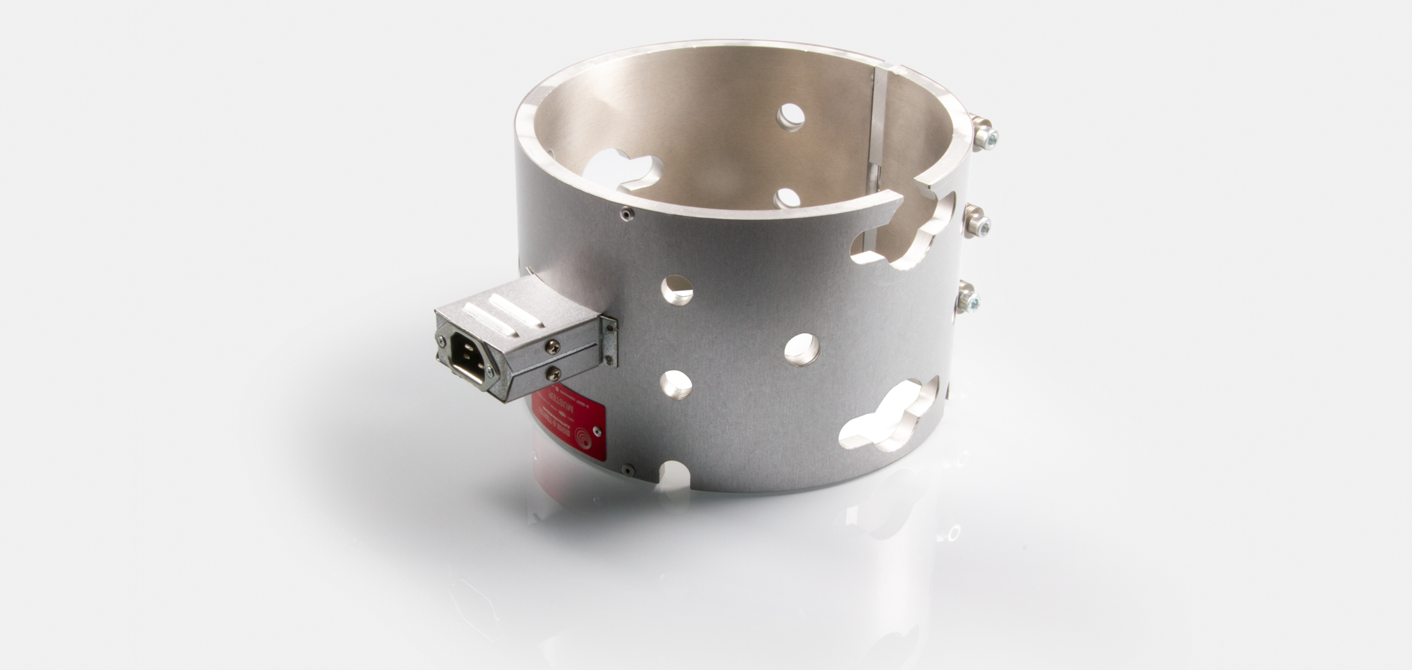 Band Heater , temperatures up to 450°C, injection molding, extrusion, energy-efficient design, homogeneous heat flow, holes, cutouts, integrated thermocouple, shape fulfilling contact