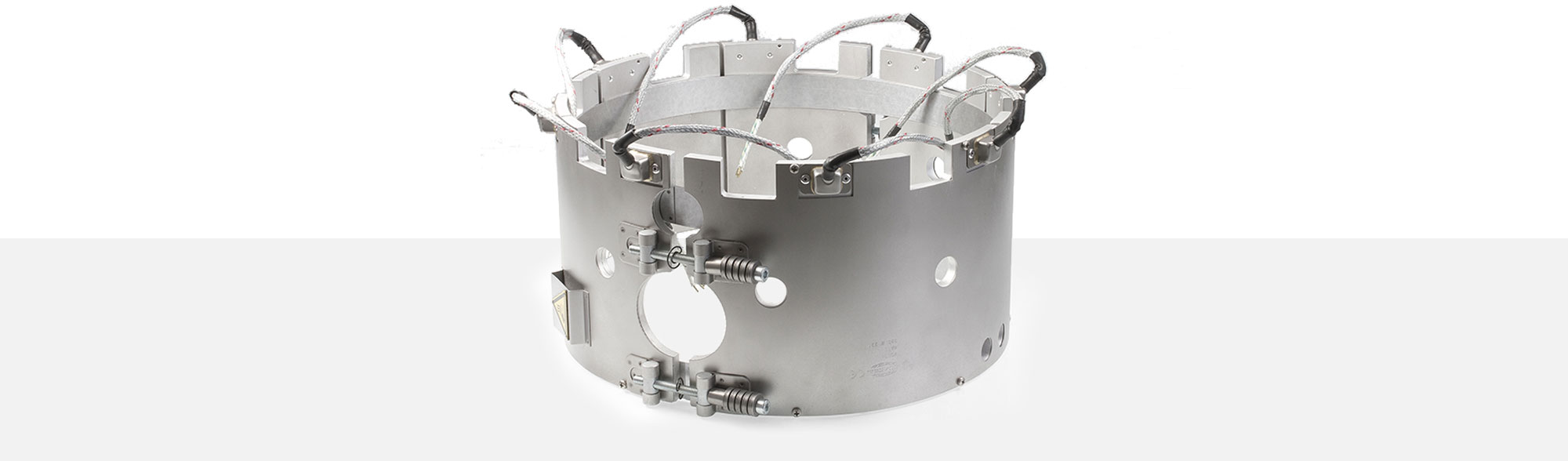 Band Heater , temperatures up to 450°C, injection molding, extrusion, energy-efficient design, homogeneous heat flow, holes, cutouts, integrated thermocouple, shape fulfilling contact