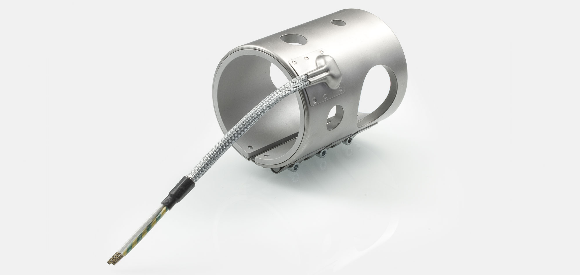 Nozzle Band Heater, for operating temperatures up to 450°C/550°C, injection molding, energy-efficient design, homogeneous heat flow, holes, cutouts, thermocouple connector, integrated thermocouple, special contour, tight installation space,cable extrusion