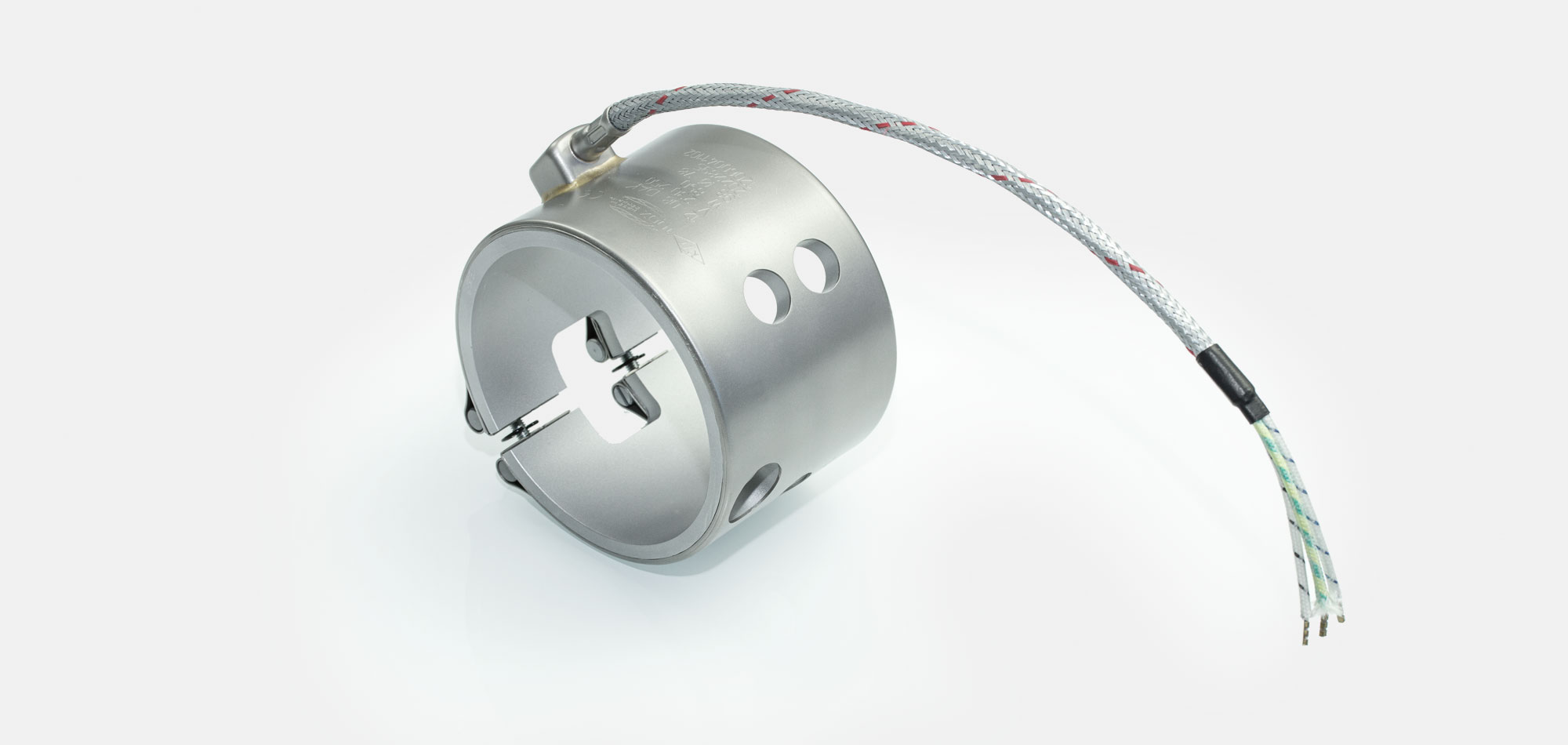 Nozzle Band Heater, for operating temperatures up to 450°C/550°C, injection molding, energy-efficient design, homogeneous heat flow, holes, cutouts, thermocouple connector, integrated thermocouple, special contour, tight installation space,cable extrusion