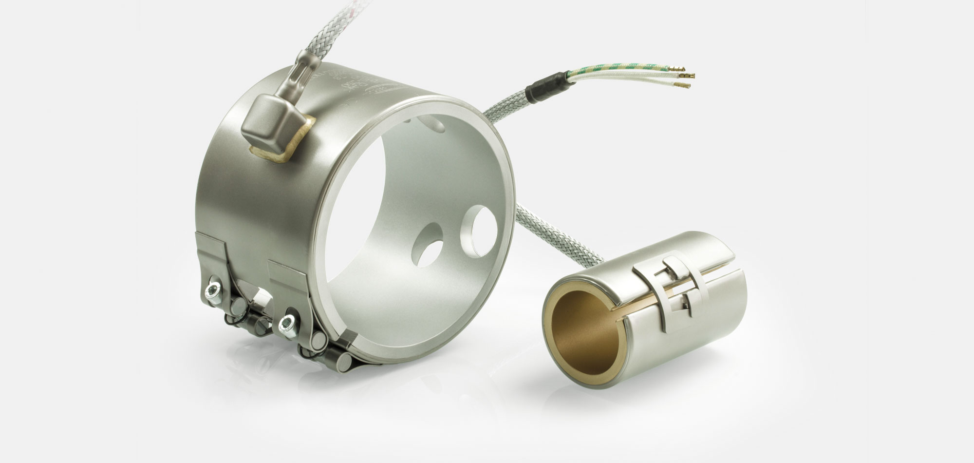 Nozzle Band Heater, for operating temperatures up to 450°C/550°C, injection molding, energy-efficient design, homogeneous heat flow, holes, cutouts, thermocouple connector, integrated thermocouple, special contour, tight installation space,cable extrusion