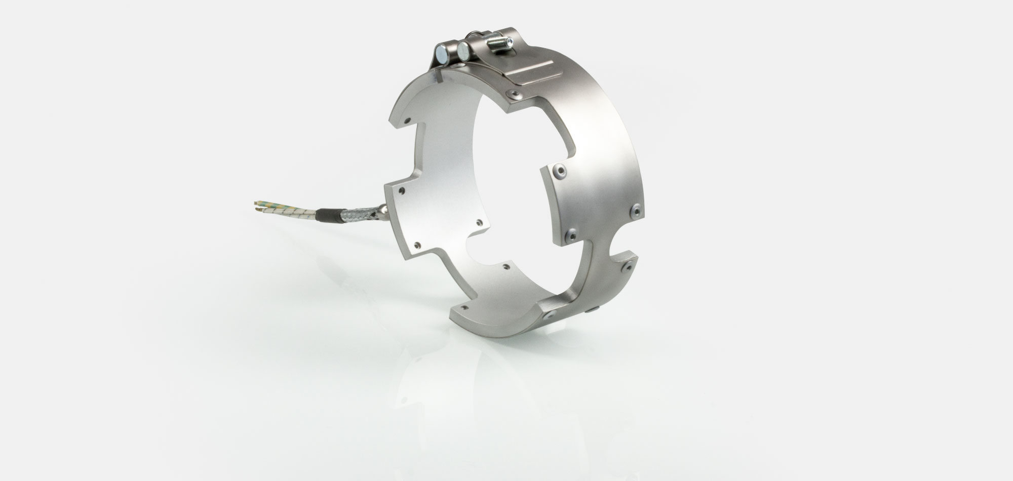 Nozzle Band Heater, for operating temperatures up to 450°C/550°C, injection molding, energy-efficient design, homogeneous heat flow, holes, cutouts, thermocouple connector, integrated thermocouple, special contour, tight installation space,cable extrusion