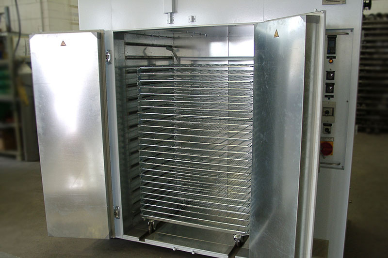 Efficient loading is provided with loading trolleys, or for pulse drying of textiles (T-shirts, Jeans, etc.), synthetic parts (hydraulic hoses) and others. The designs of trolleys are as per application requirements. Drying times can be realised via time